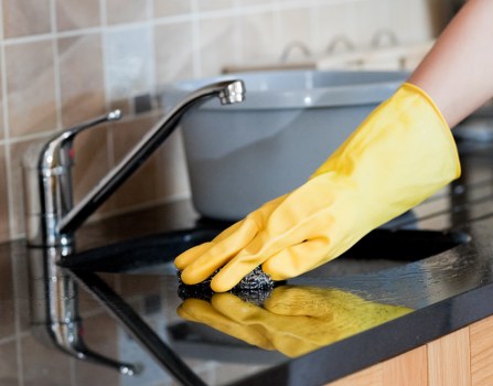 Deep cleaning of tile and grout on a hard floor in Merton