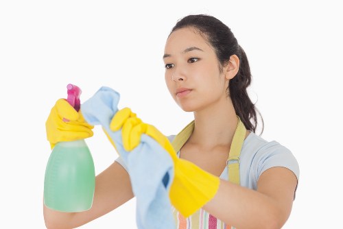 Hot water extraction cleaning equipment used on carpet fibres
