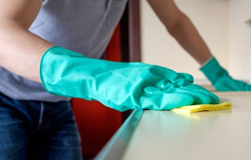 Cleaning team managing waste according to regulations