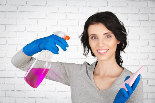 Cleaner using supplies during a scheduled property clean